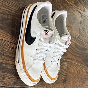 Nike Women's White Sneakers with Black and Tan Accents